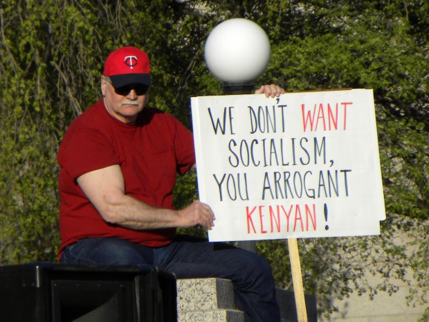 Tea Party protester with sign: ‘We don't WANT socialism, you arrogant KENYAN!’